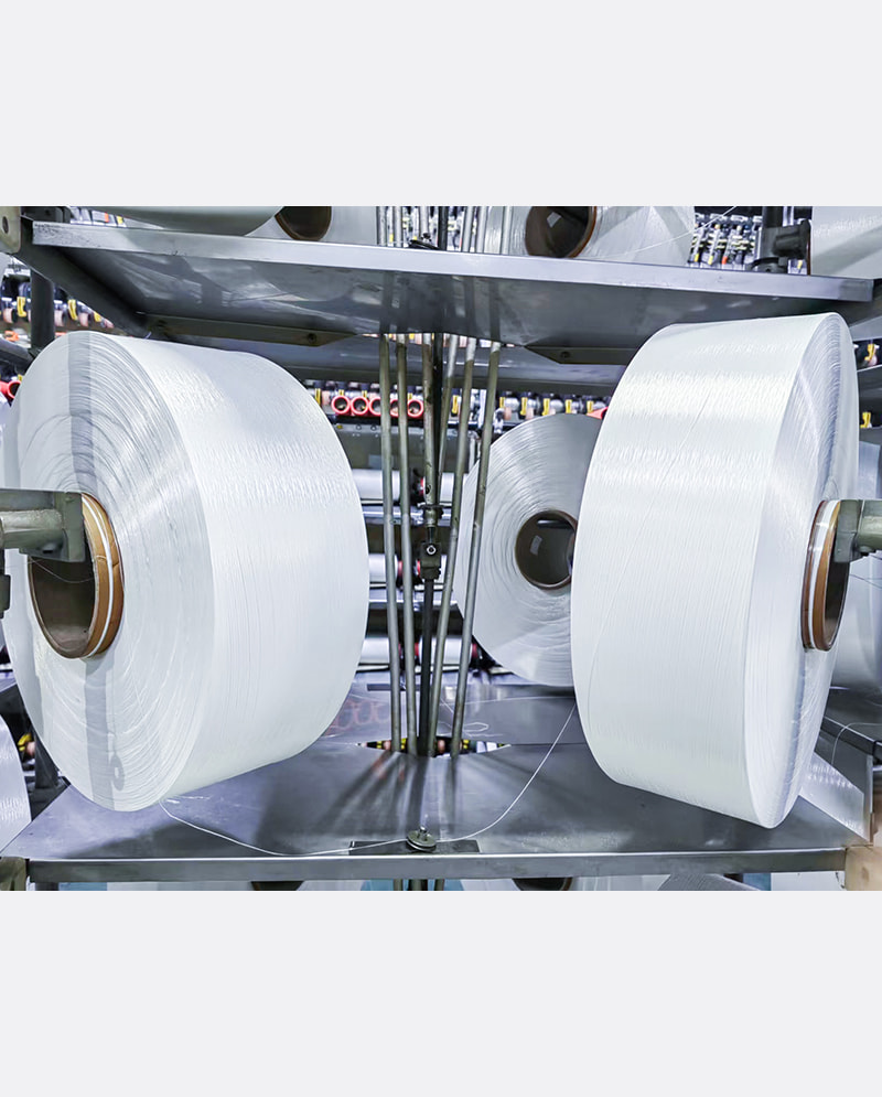 Qual è il ruolo del filato FDY riciclato nella riduzione dei rifiuti tessili?